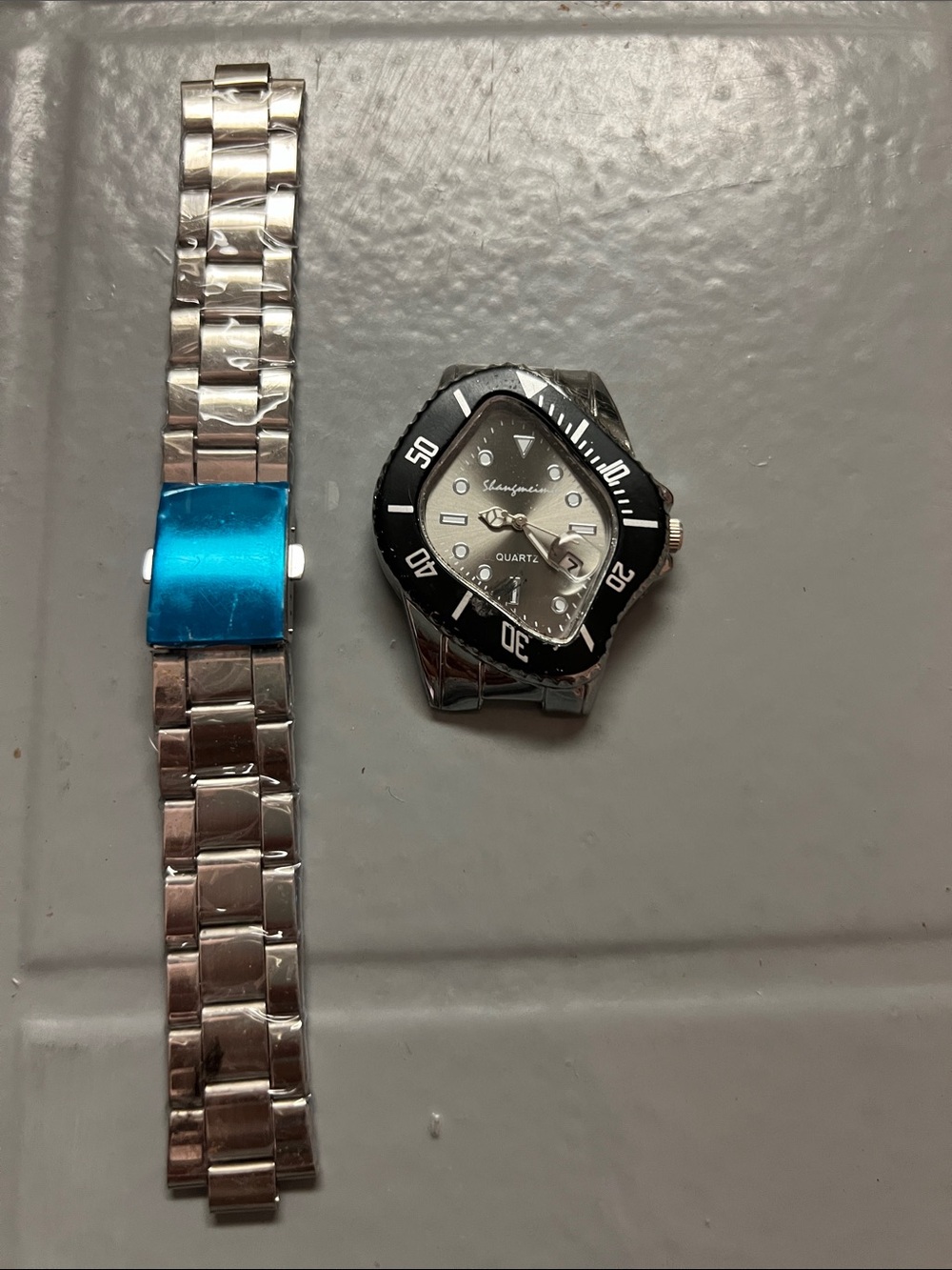 🔥 Wavy face Silver Stainless Steel Watch with Black Bezel